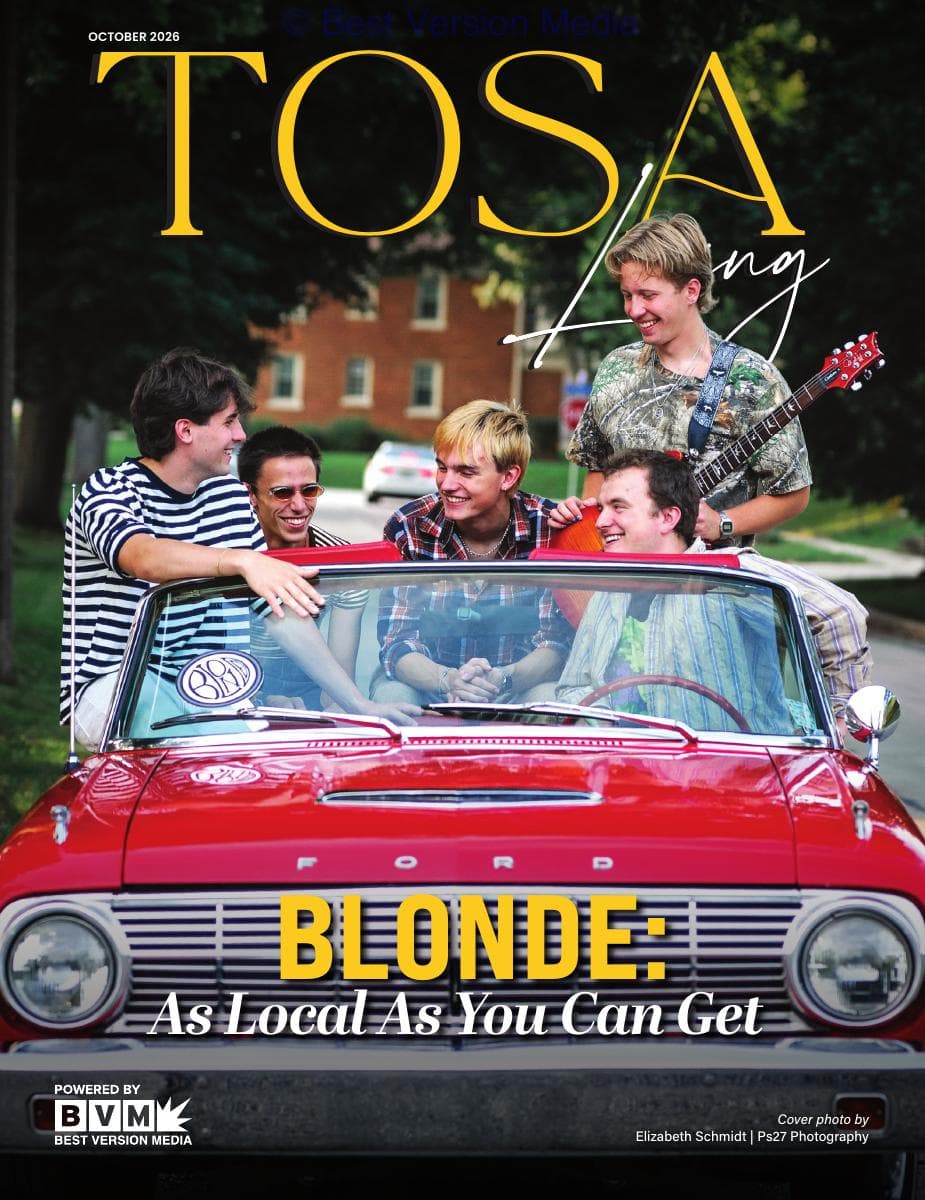 Tosa Living October 2026 cover featuring Blonde in their red convertible